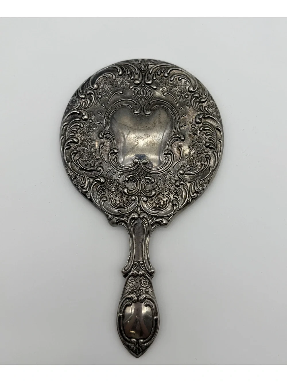 Vintage Ornate Silver Handheld Mirror with Floral Engraving